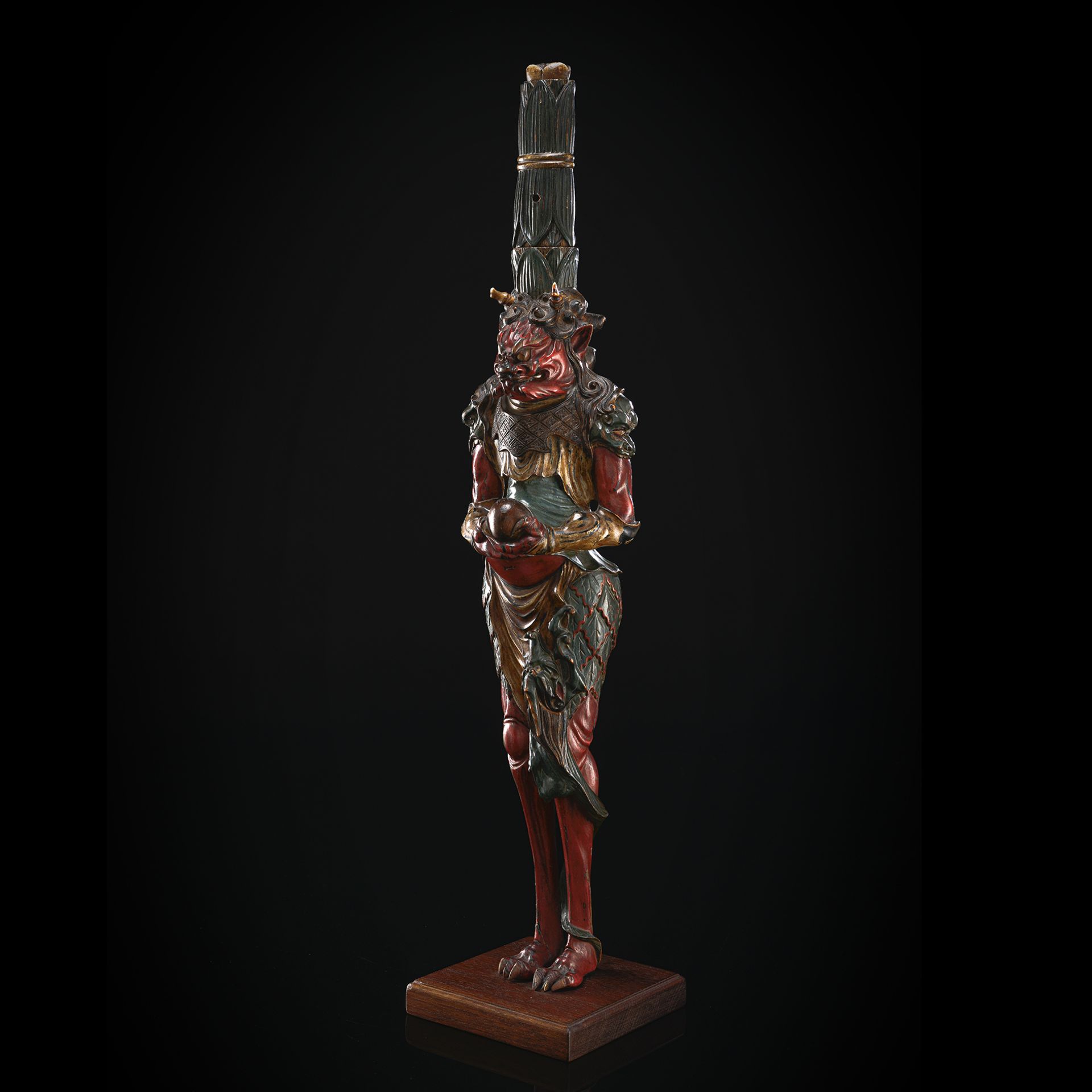A RARE LACQUERED AND PAINTED SOWRD STAND IN FORM OF A STANDING ATTENDANT OF RYUJIN WITH BLADE