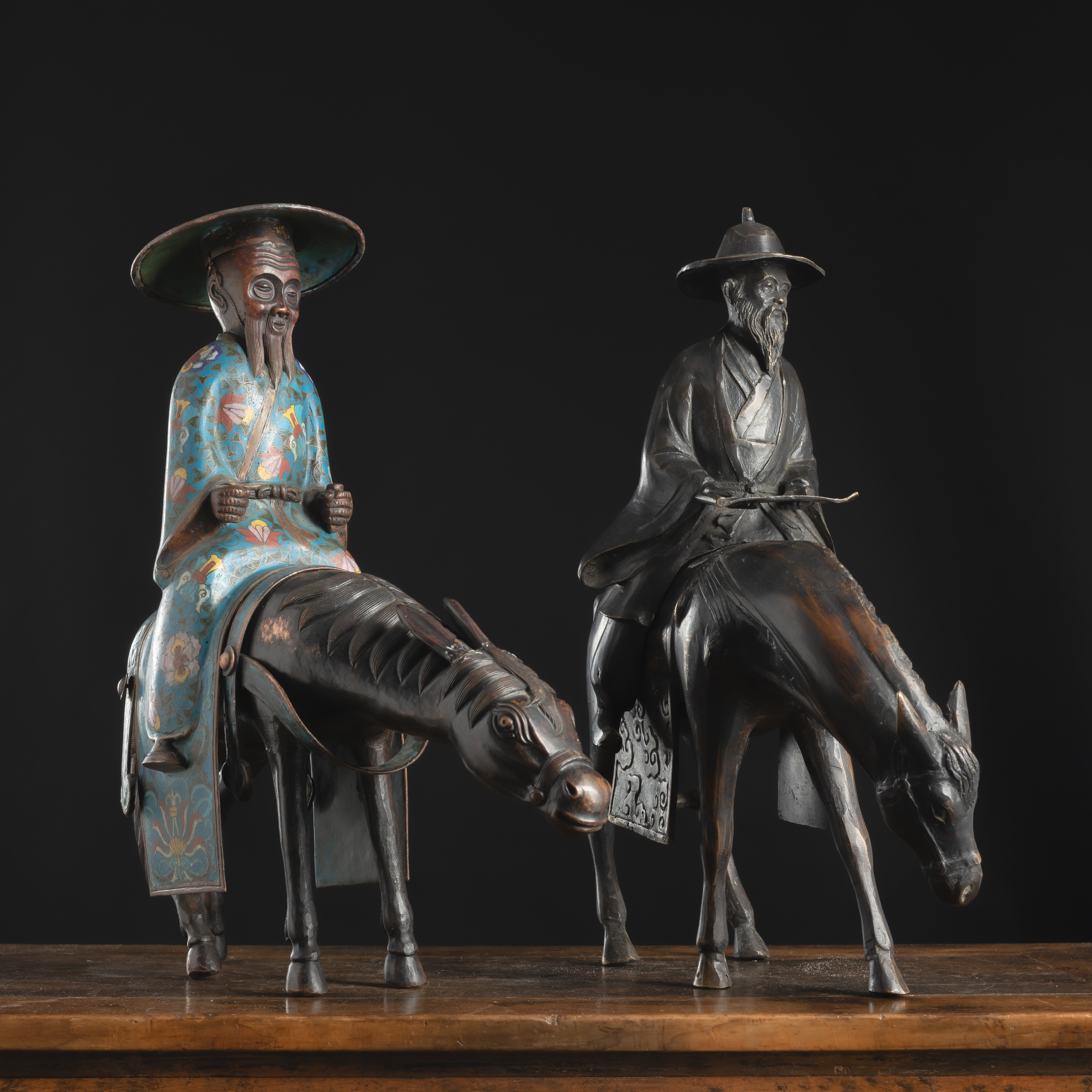 TWO BRONZES OF HORSE RIDING FIGURES, ONE WITH CLOISONNÉ-ENAMELS