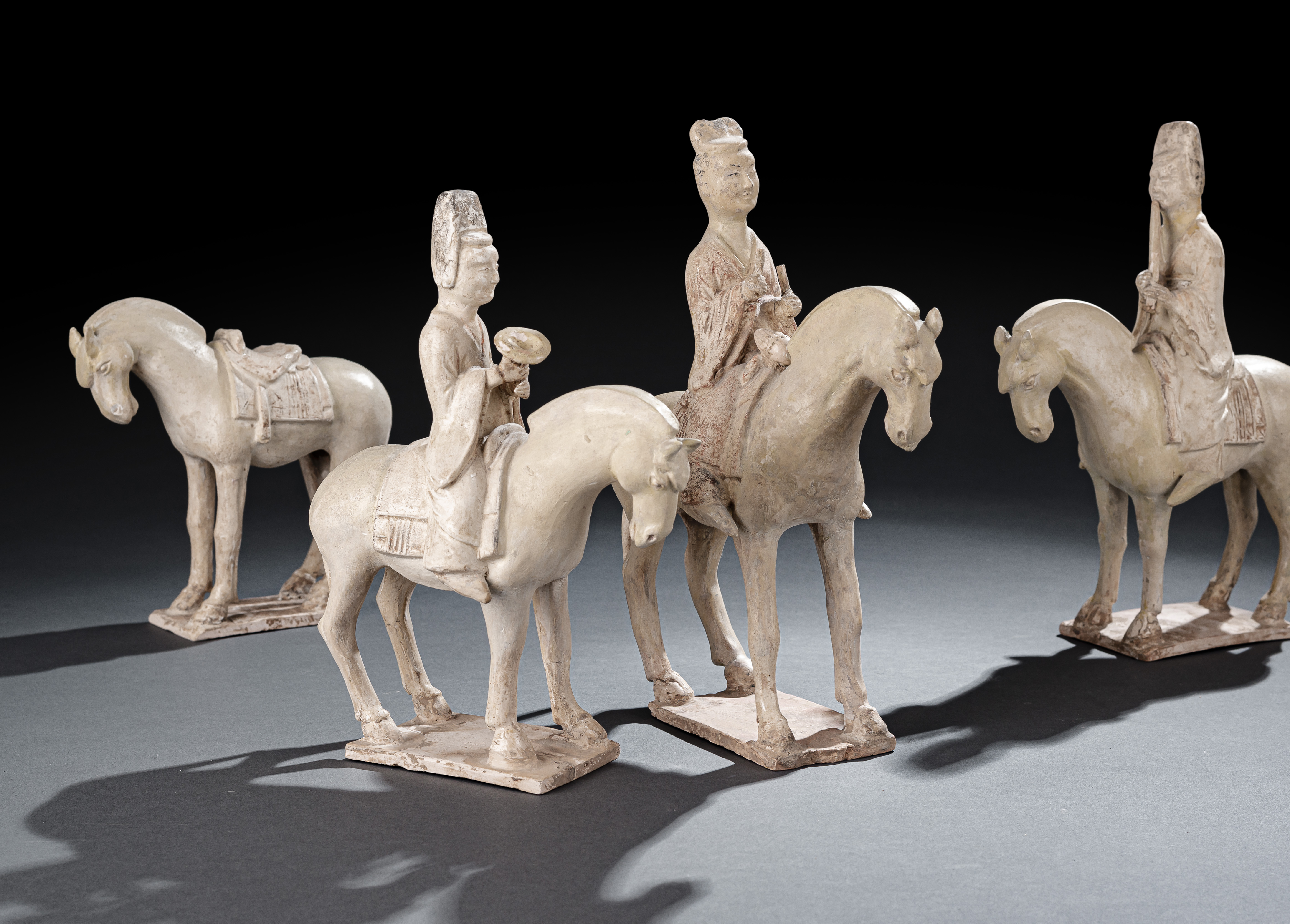 A GROUP OF FOUR STRAW-GLAZED EARTHENWARE HORSES AND RIDERS AND A HORSE - Image 3 of 4
