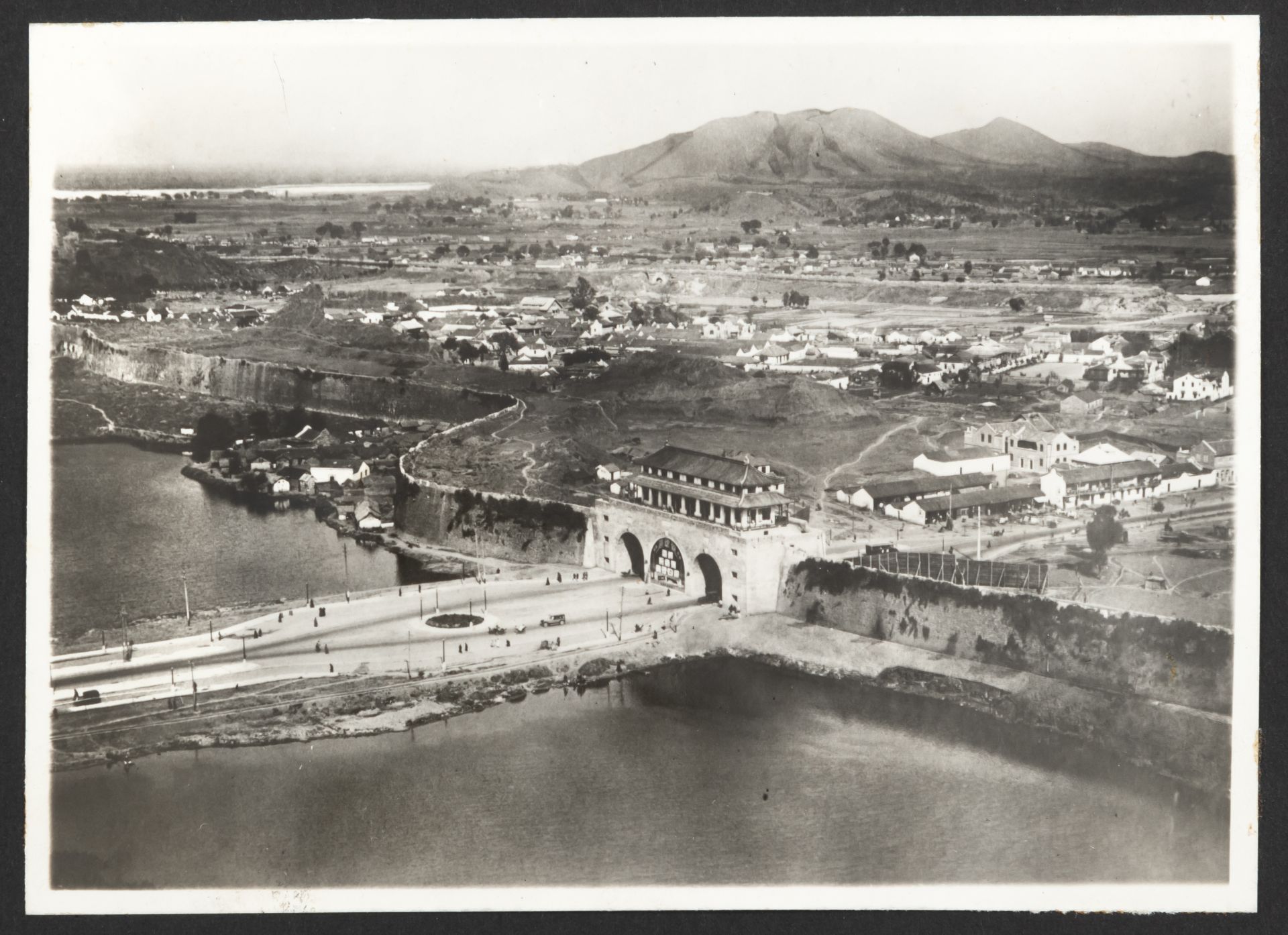 AN ALBUM WITH AERIAL PHOTOGRAPHS OF NANKING AND A FOLDER WITH PHOTOGRAPHS