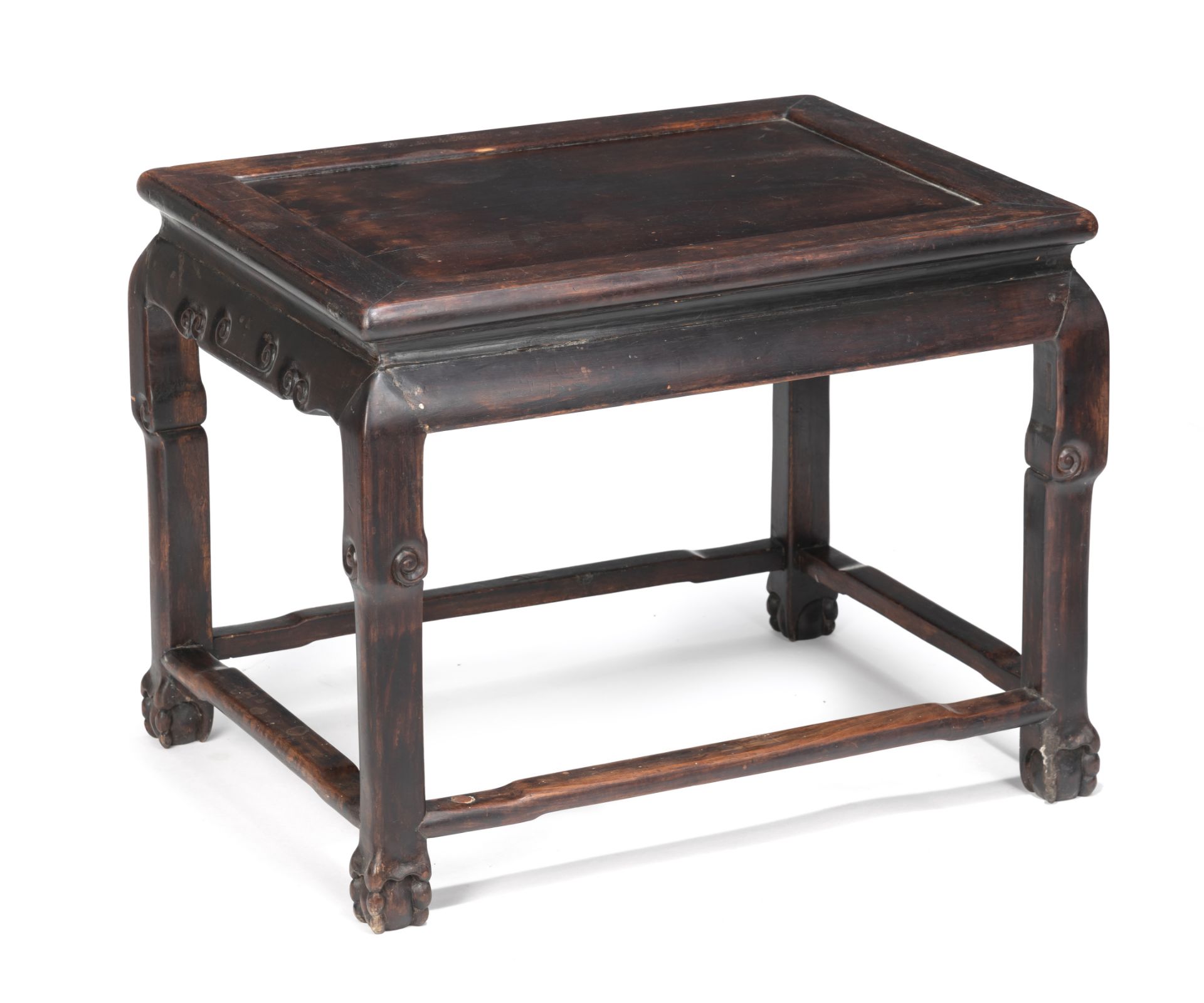 A SIDE TABLE WITH VOLUTE CARVINGS