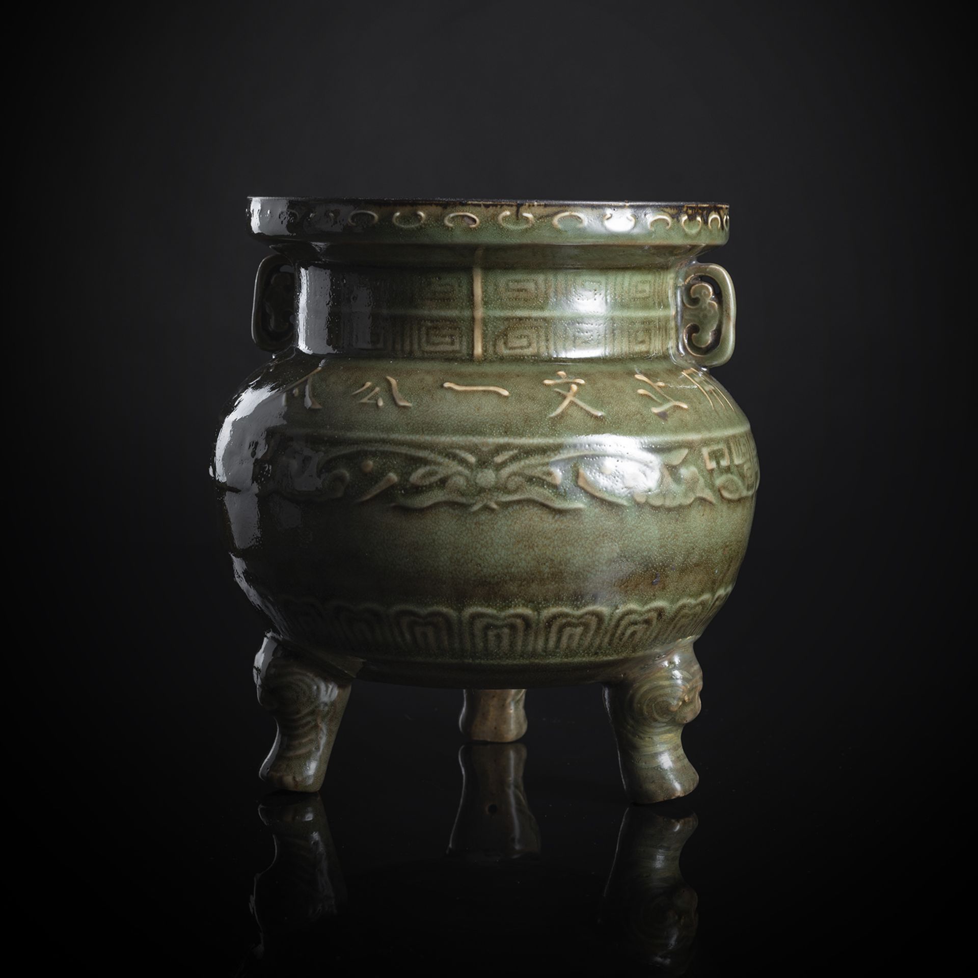 A CELADON GLAZED TRIPOD CENSER IN ARCHAIC STYLE