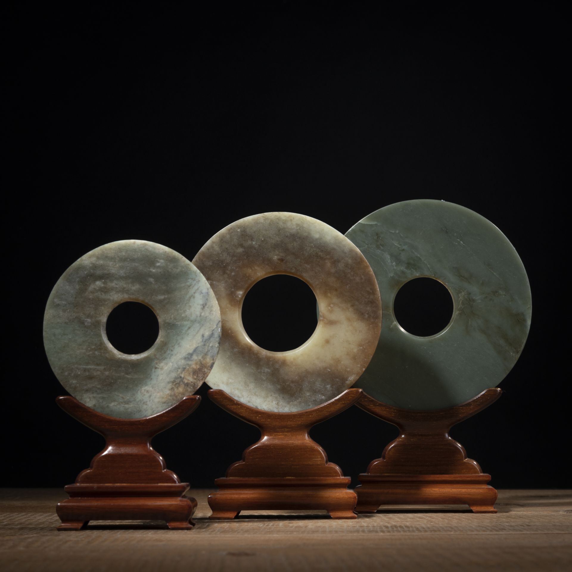 THREE JADE 'BI' DISCS