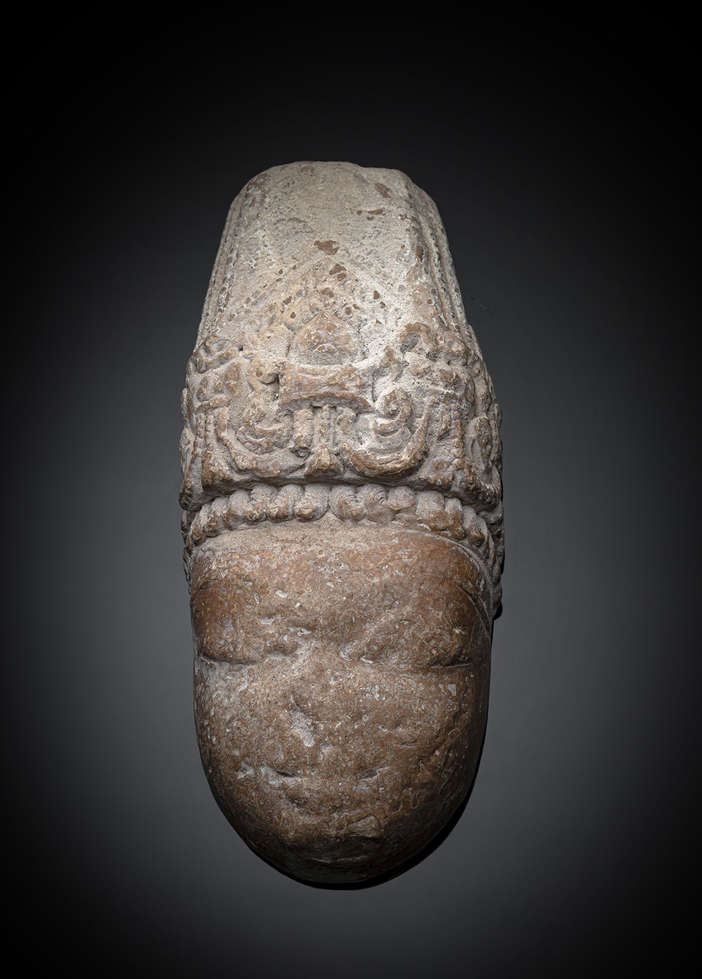 A SANDSTONE HEAD OF PROBABLY VISHNU