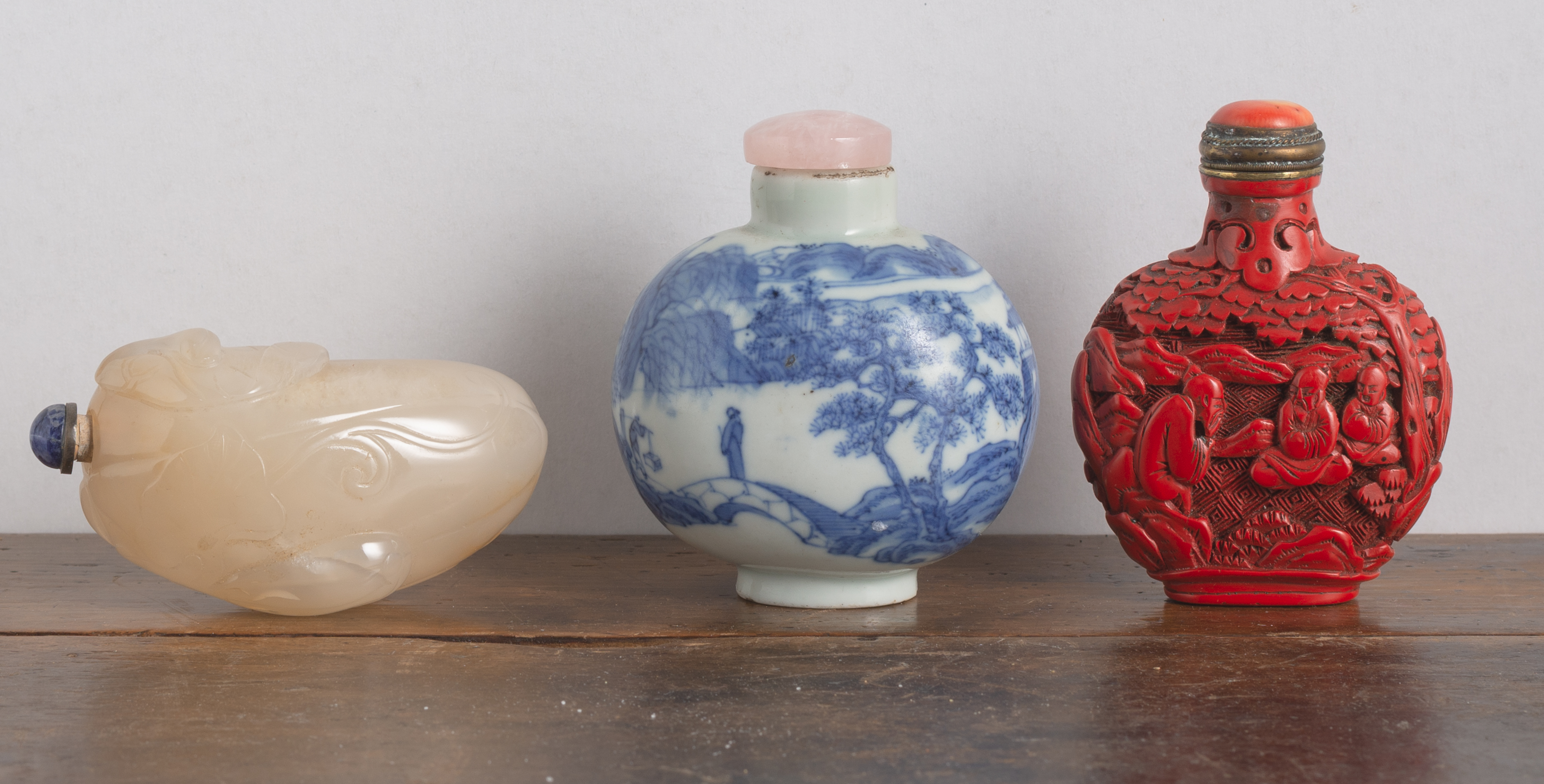 THREE RED-LACQUER, PORCELAIN, AND JADE SNUFFBOTTLES - Image 2 of 3