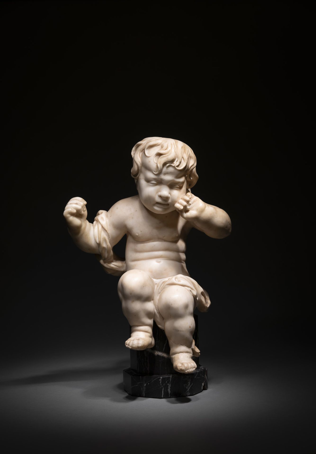 Weinender Putto