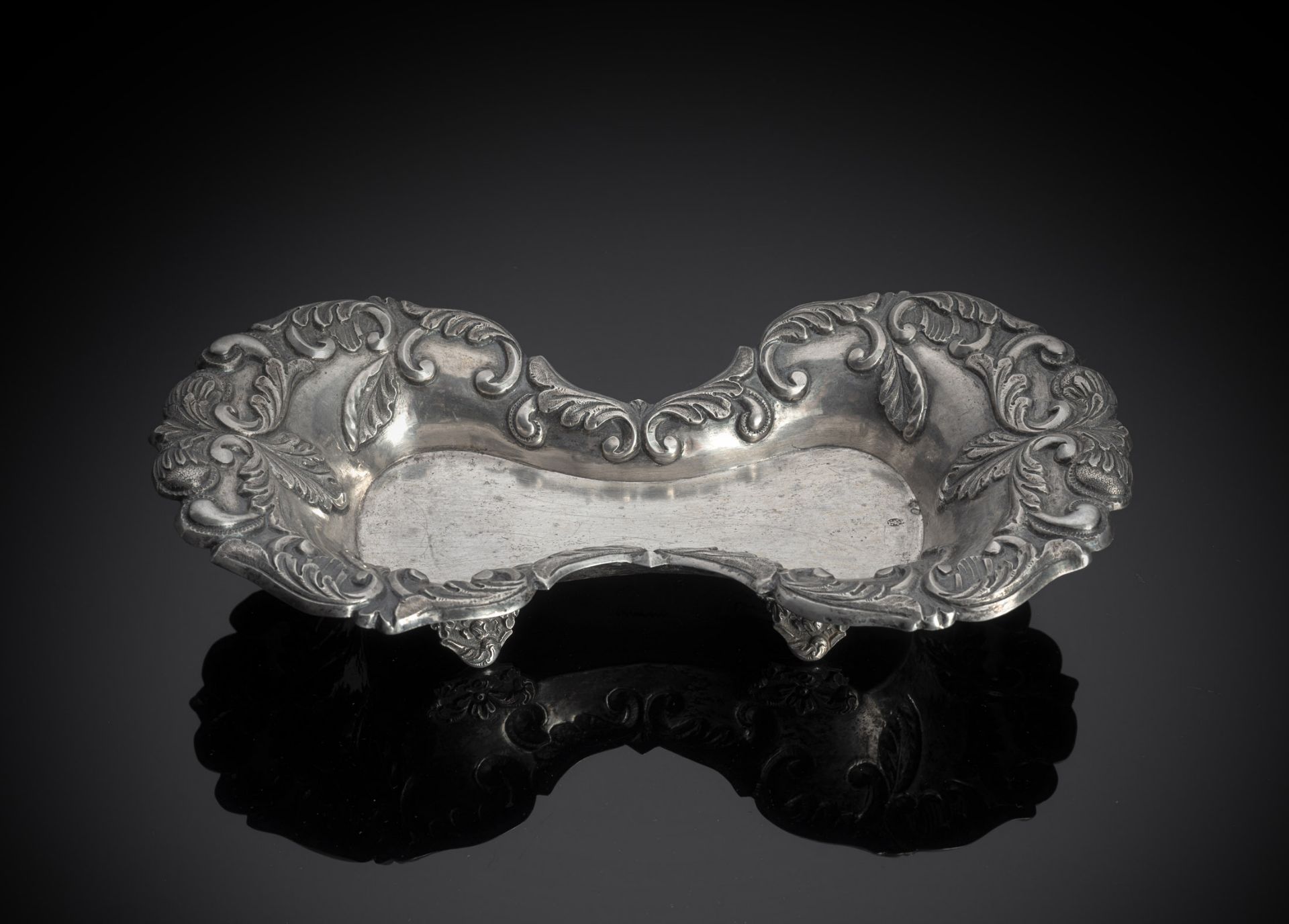 A ROCOCO STYLE SILVER FOOTED BOWL