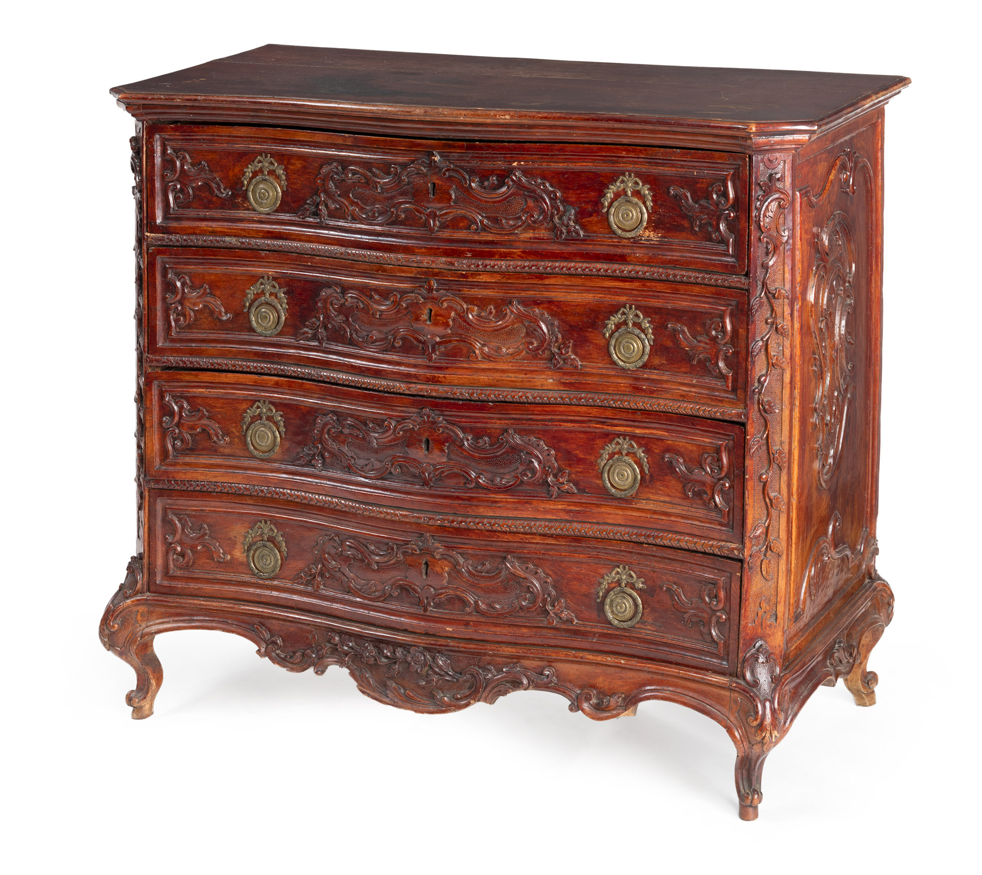 A LARGE BRASS MOUNTED CARVED WALNUT ROCOCO COMMODE