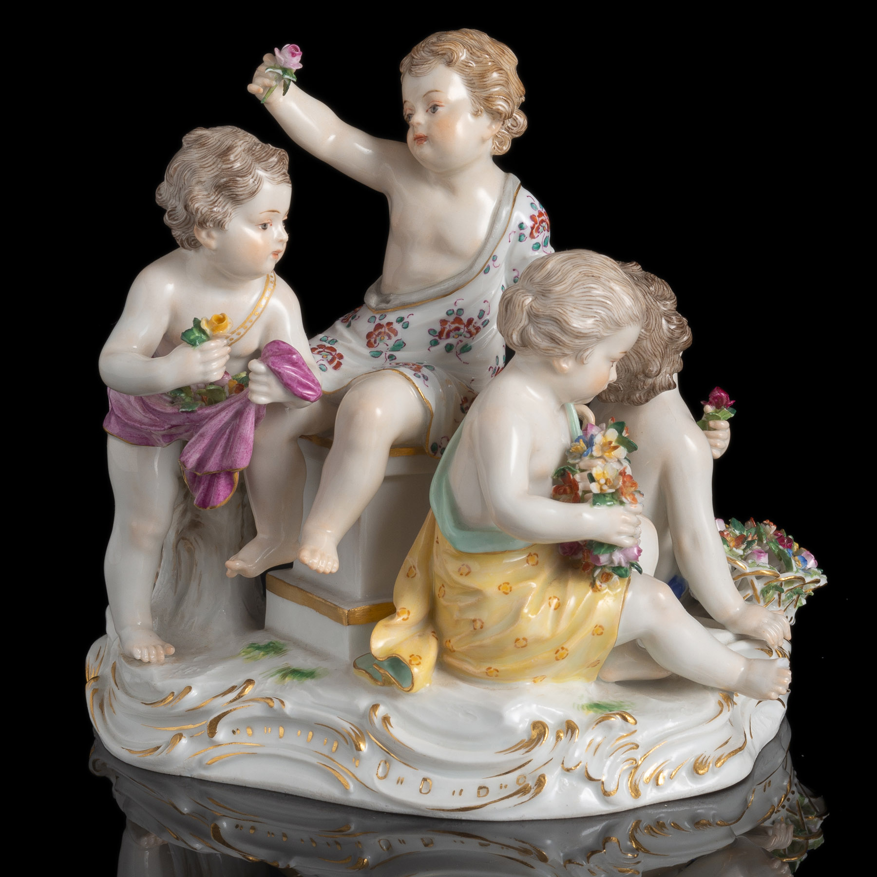 A MEISSEN GROUP OF FOUR CHILDRED DEPICTING SPRING