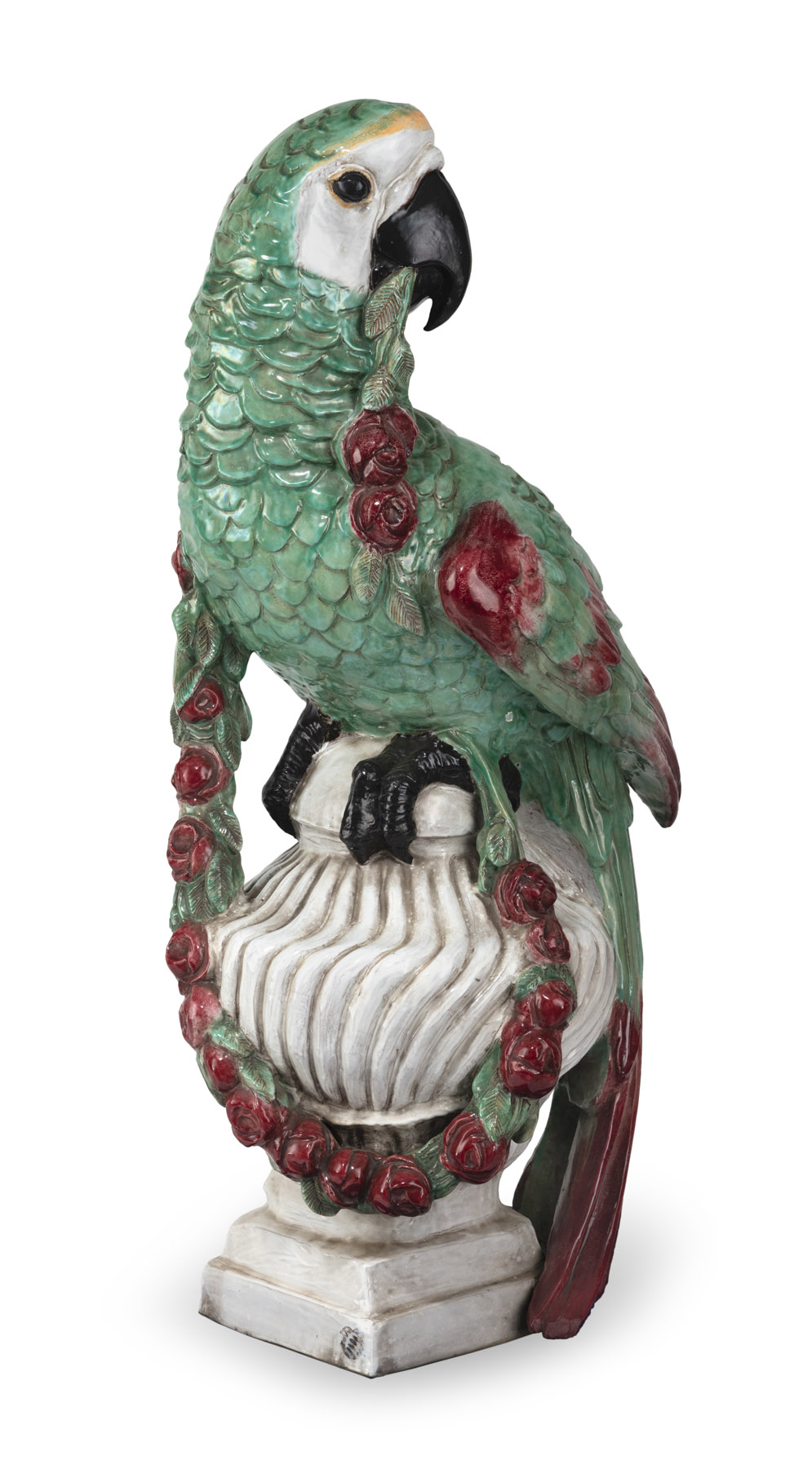 A LARGE NYMPHENBURG MAIOLICA FIGURE OF A MACAW WITH GARLAND