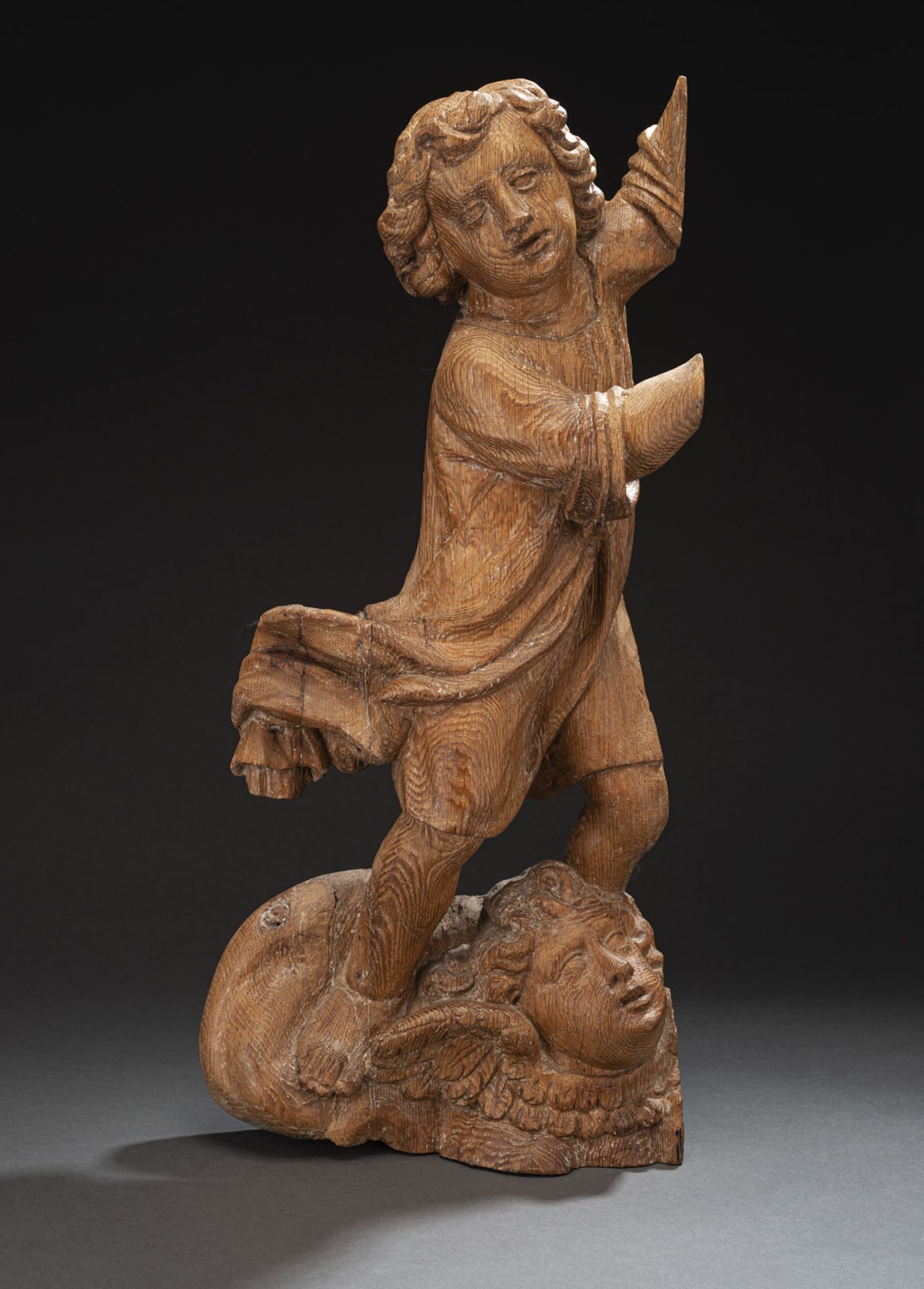 A BAROQUE WOODCARVED ANGEL