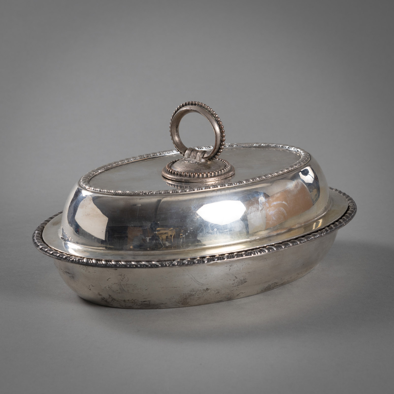 A SILVER OVAL TUREEN AND COVER