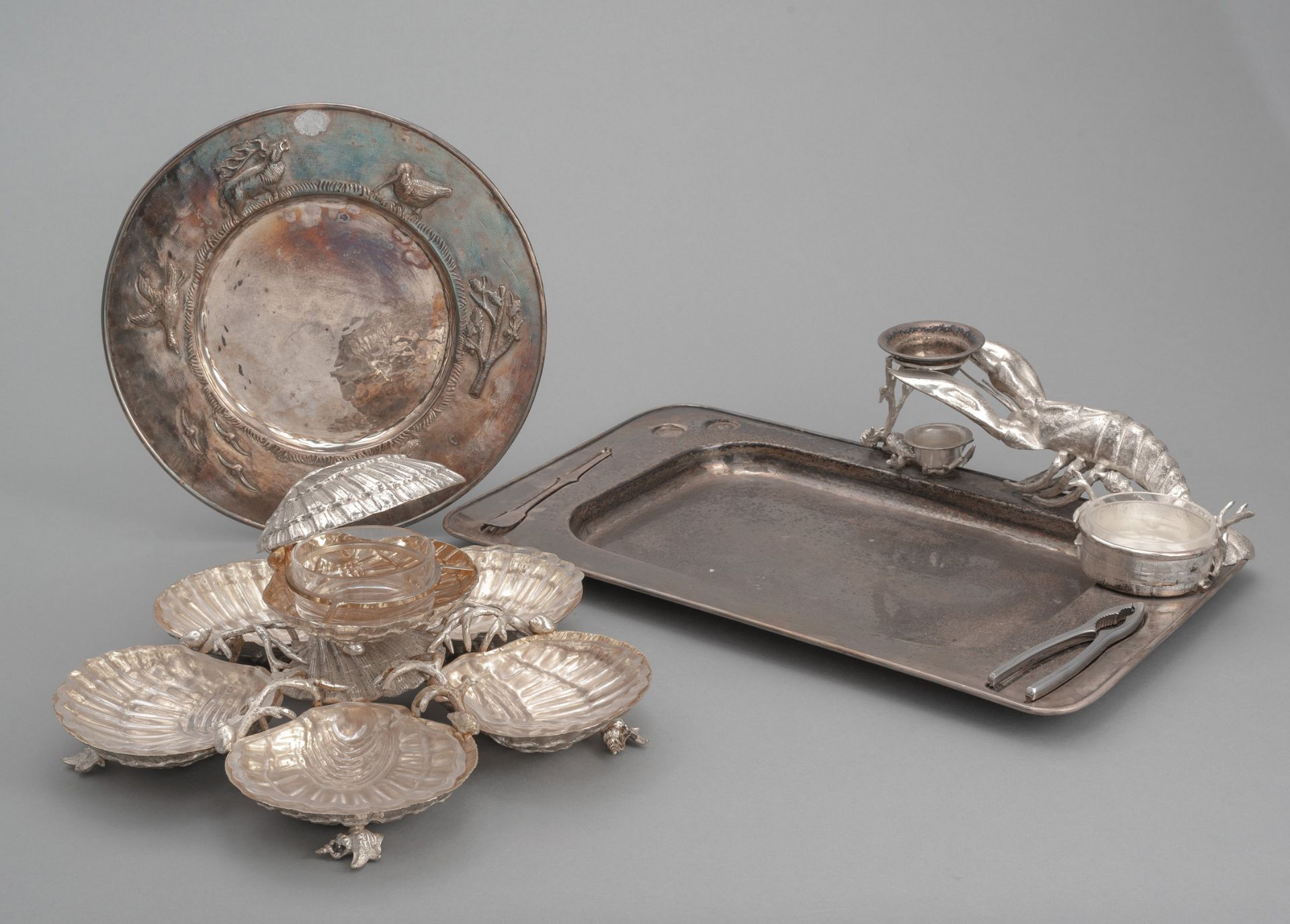 A SEAFOOD DISH, A CENTRE PIECE FOR OYSTERS AND A ROUND DISH WITH GAME