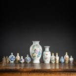 A GROUP OF TWO 'FAMILLE ROSE' VASES, NINE POLYCHROME PORCELAIN AND METAL SNUFF BOTTLES, AND MINIATU