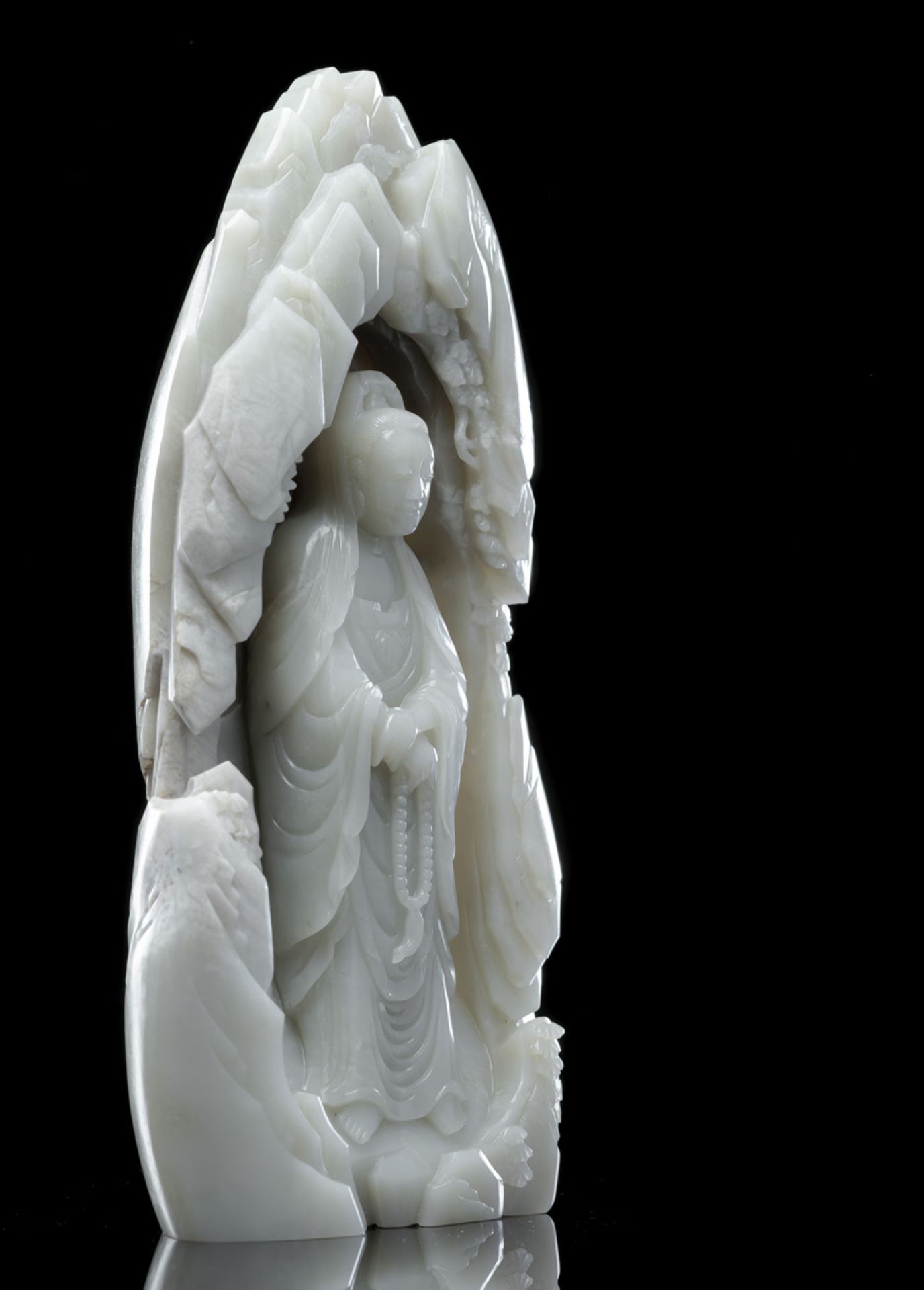 A RARE PALE CELADON JADE FIGURE OF GUANYIN IN A GROTTO - Image 2 of 6