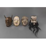 THREE CARVED AND PAINTED WOODEN NÔ MASKS AND A WOODEN HANNYA MASK