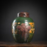 A GREEN-GROUND 'FAHUA'-STYLE FLORAL RELIEF VASE