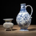 A BLUE AND WHITE PORCELAIN EWER AND AN OPENWORK TRIPOD KORO