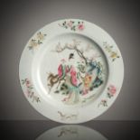 A FAMILLE ROSE PORCELAIN PLATE WITH MAGU AND DEER