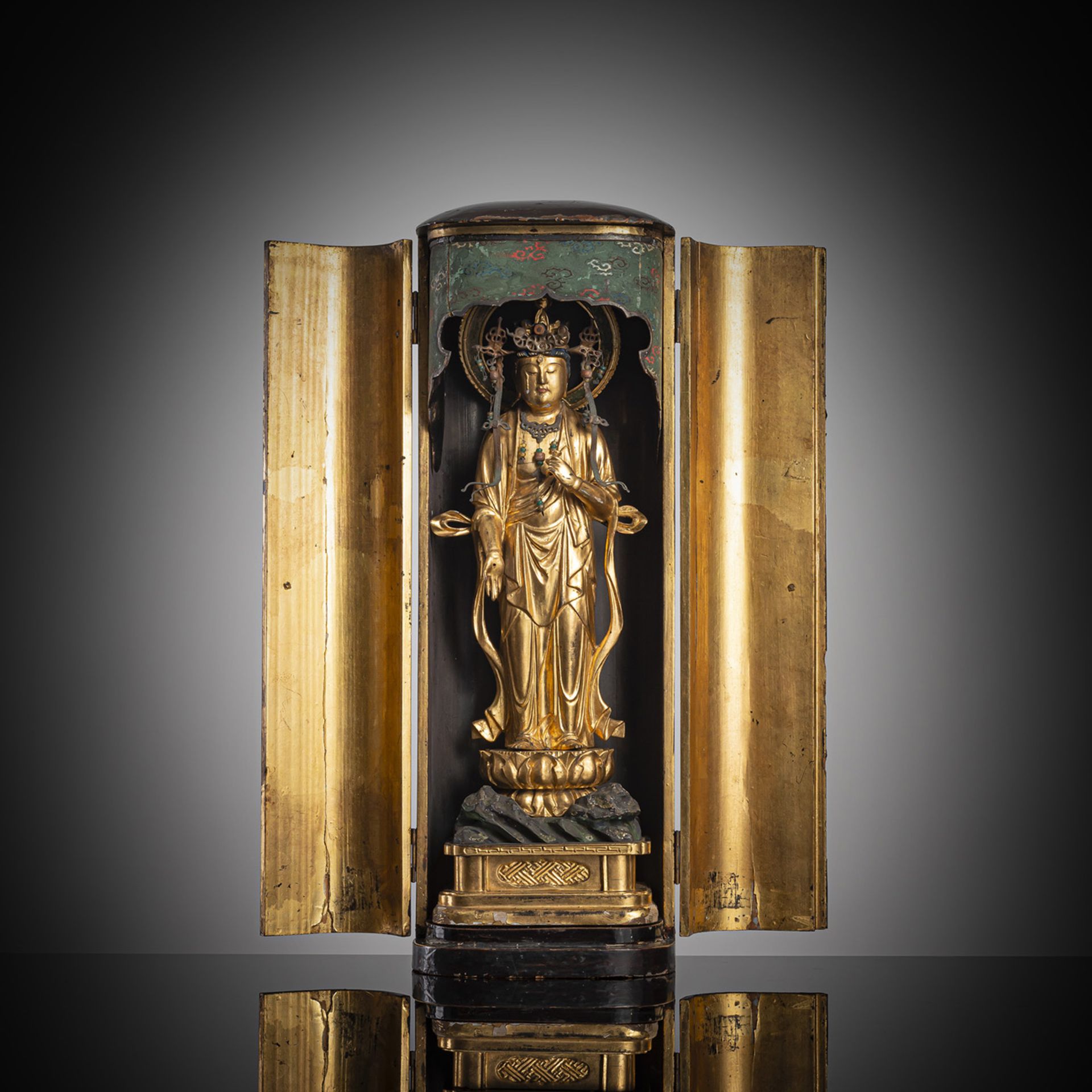 A GILT- AND BLACK-LACQUERED AND POLYCHROME WOOD SHRINE (ZUSHI)