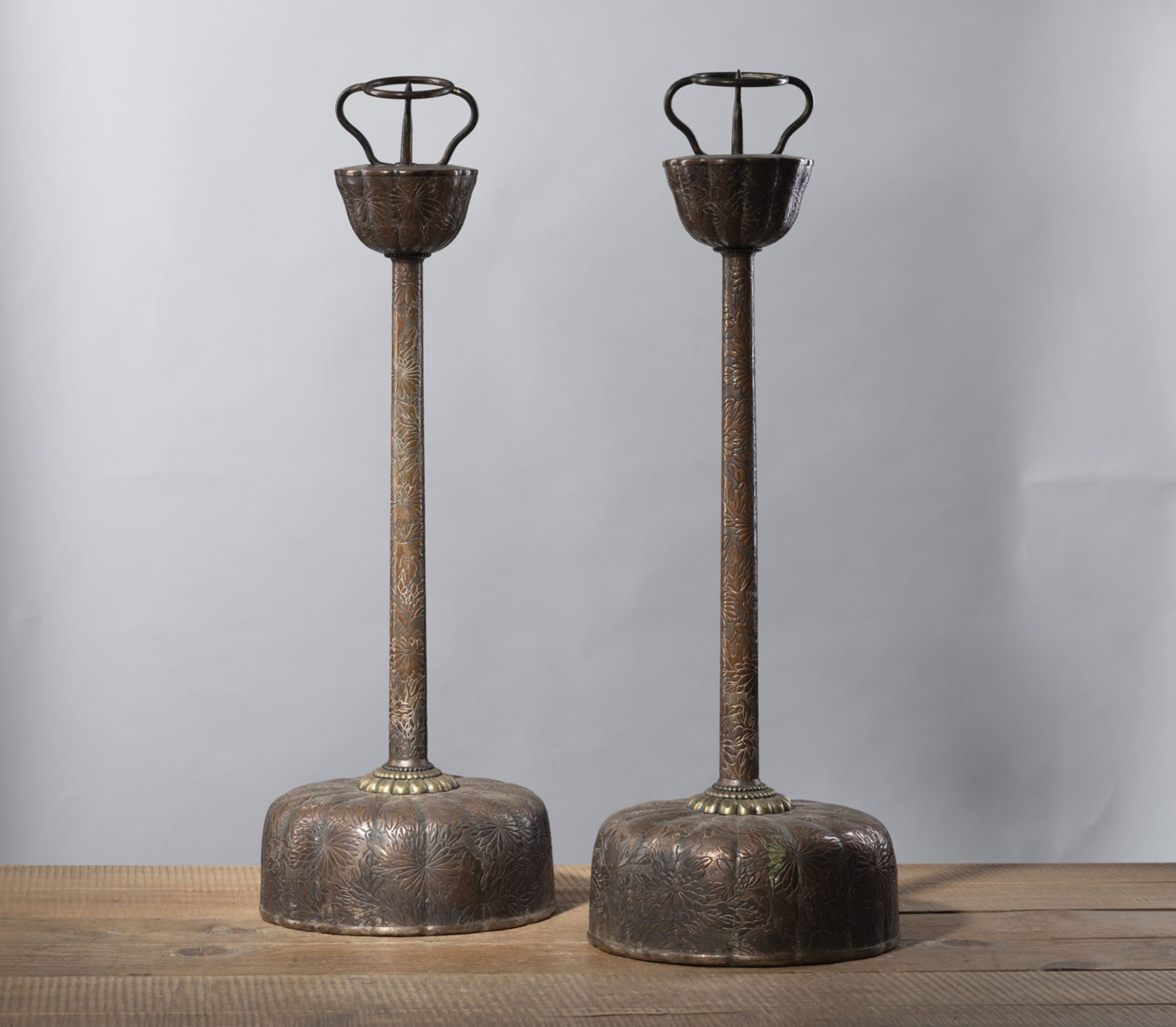 A PAIR OF COPPER FLORAL RELIEF CANDLESTICKS - Image 2 of 4