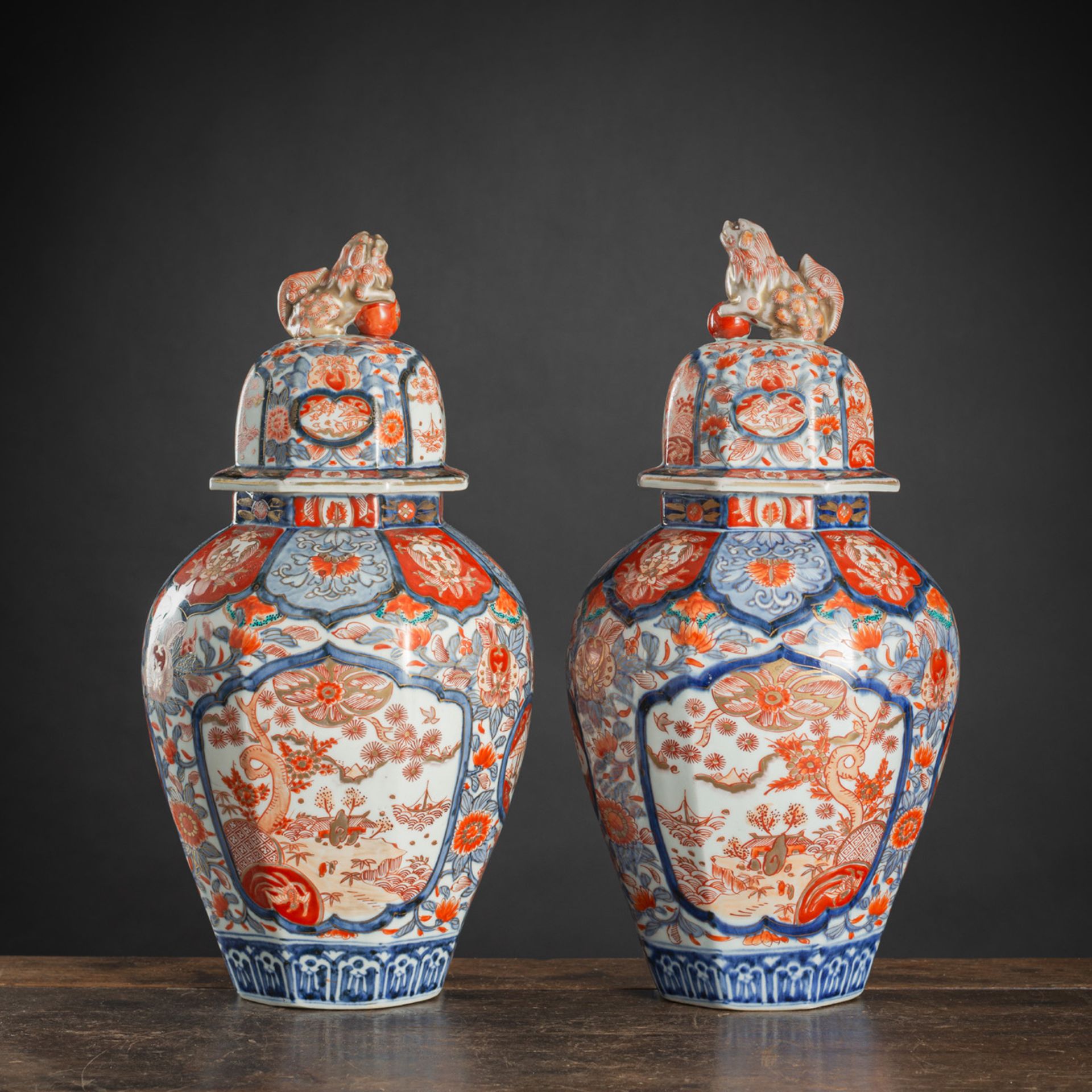 A PAIR OF OCTAGONAL IMARI PORCELAIN VASES