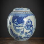 A BLUE AND WHITE FIGURAL PORCELAIN JAR AND COVER