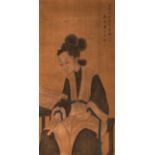 A PAINTING OF A READING LADY IN THE STYLE OF TANG YIN