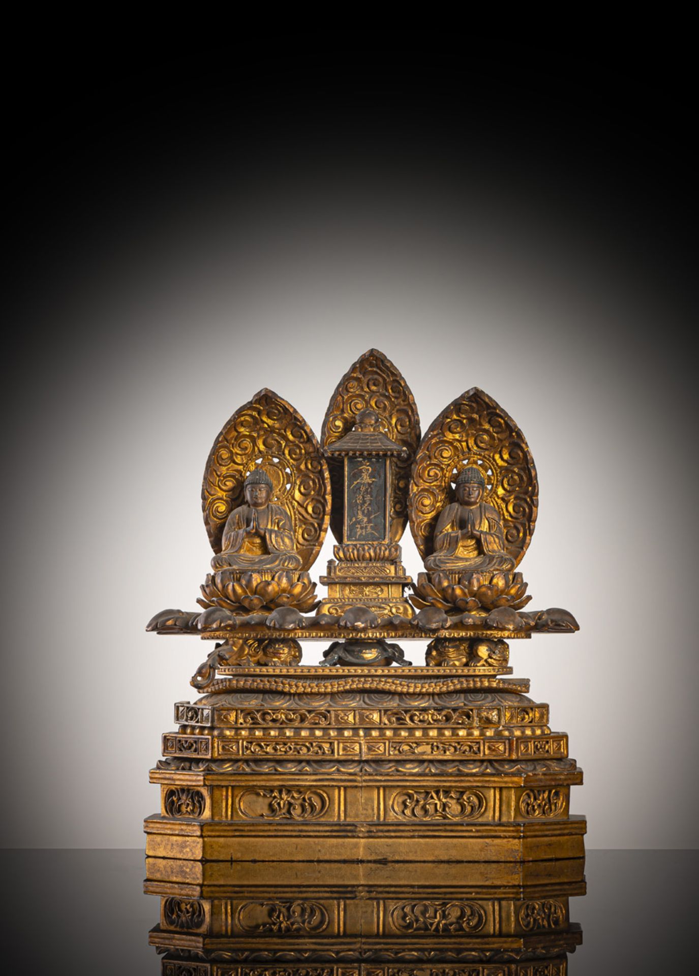 A GILT- AND BLACK-LACQUERED WOOD SHRINE