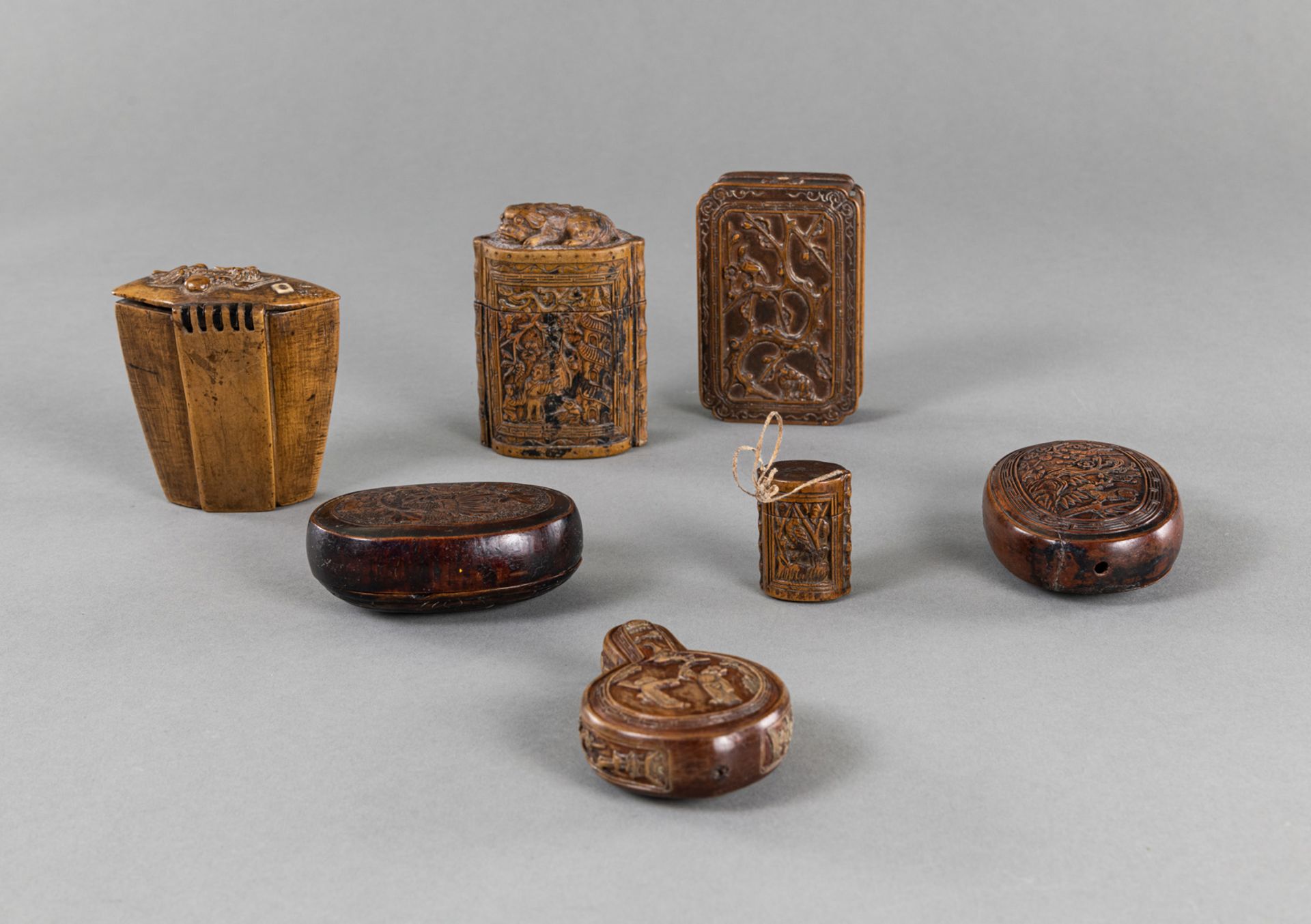 A GROUP OF SEVEN CARVED RELIEF WOOD OPIUM BOXES - Image 2 of 3