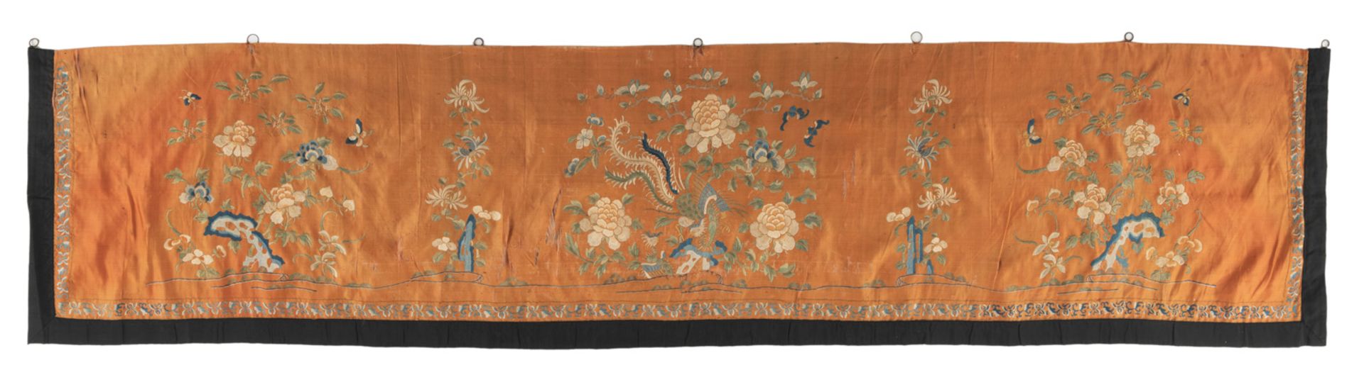 AN ORANGE-GROUND EMBROIDERED SILK HANGING