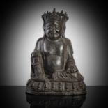 A BRONZE FIGURE OF SEATED BUDAI ON A LOTUS THRONE