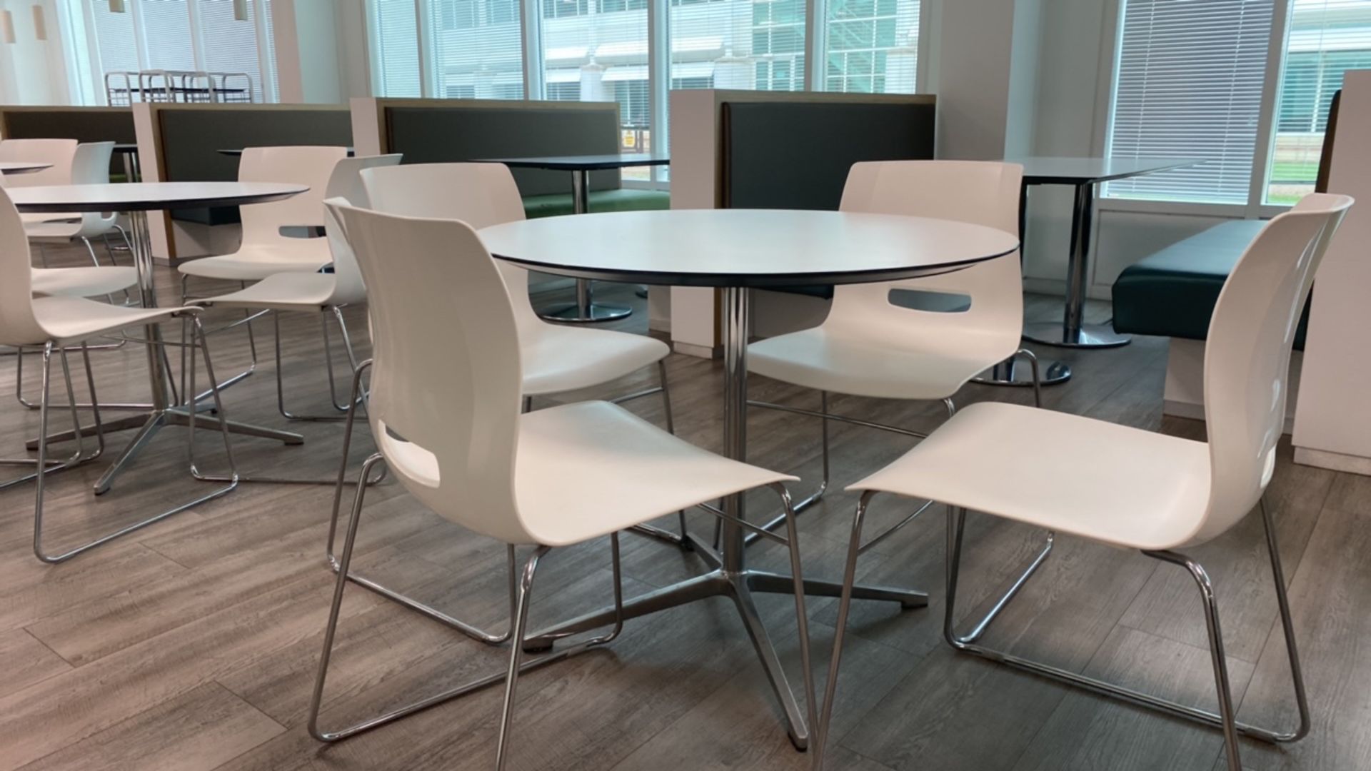 Set Of 4 White Chairs And Circular Table