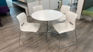 Set Of 4 White Chairs And Circular Table