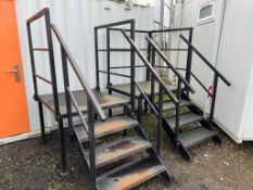 2 sets of 4 tread metal steps with platform