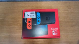 NINTENDO SWITCH CONSOLE RED/BLUE