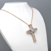 18ct rose gold cross set with diamonds totalling 1.51 carats. With chain and box