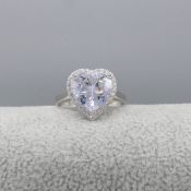 Large silver heart shaped stone-set ring with stone-set halo