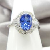 18ct white gold oval tanzanite and diamond cluster ring