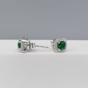 Pair of chamfered square stud earrings set with green and white stones