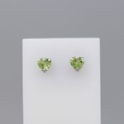 Heart-shaped ear studs set with peridot gemstones, in 18ct white gold, boxed