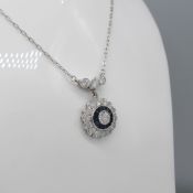 Exquisite platinum sapphire and diamond daisy-style evening wear necklace