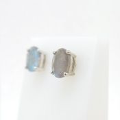 Pair of silver stud earrings set with oval-cut labradorite gemstone