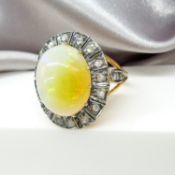 Large and weighty cabochon Ethiopian opal and rose-cut diamond cocktail ring