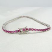 3.21 carat ruby articulated line bracelet In 18ct white gold, boxed