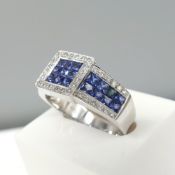 Art Deco-style 18ct white gold calibre-cut sapphire and round brilliant-cut diamond ring