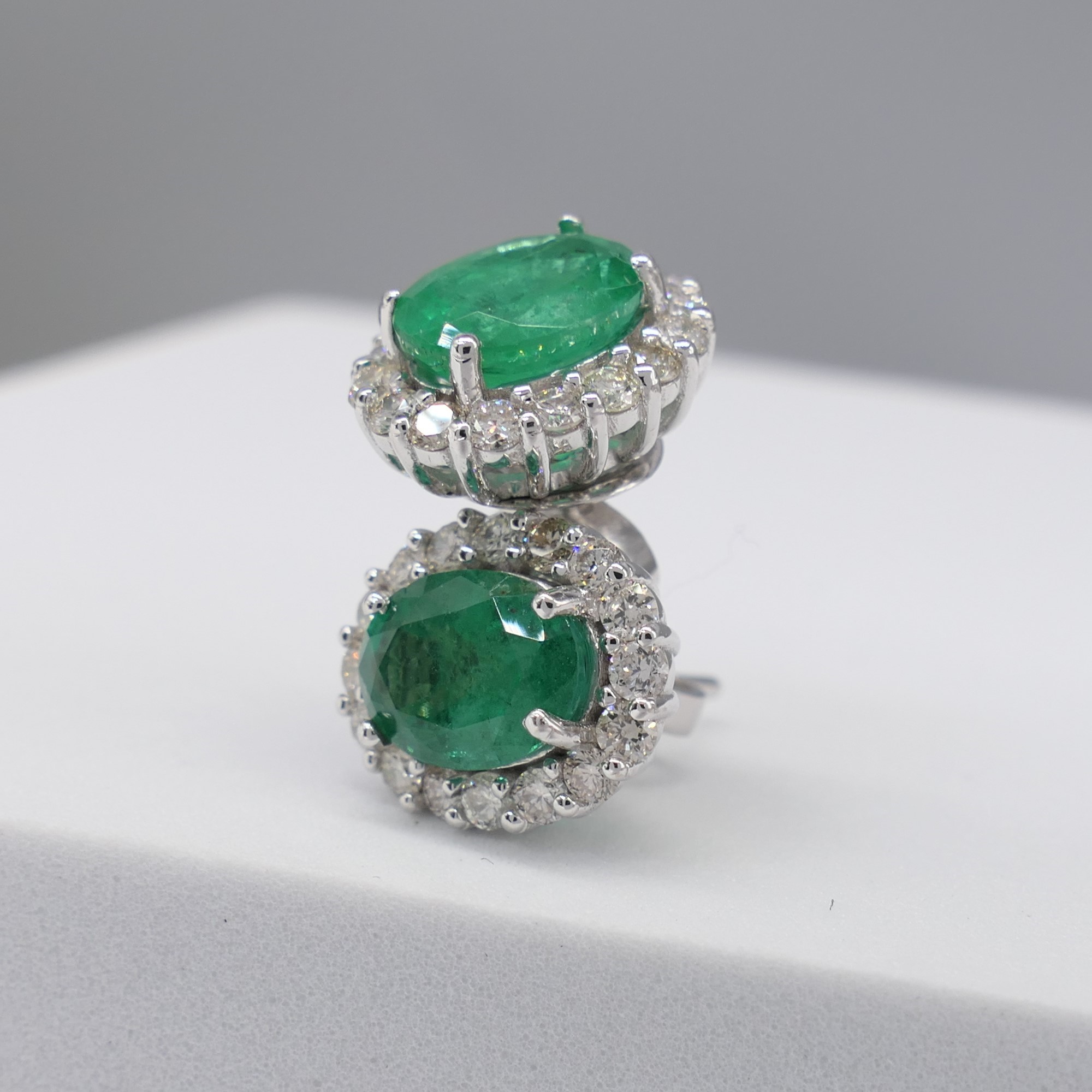 Pair of 18ct white gold oval emerald and diamond cluster ear studs, boxed - Image 5 of 7