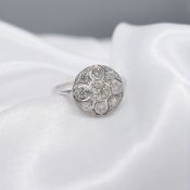 Platinum and 0.60ct diamond vintage-style cluster ring