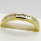 18ct yellow gold 0.50 carat tapered baguette diamond eternity ring, with certificate