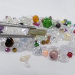 A parcel of 95.00 carats of mixed loose gems, stones and beads including quartz and cubic zirconia